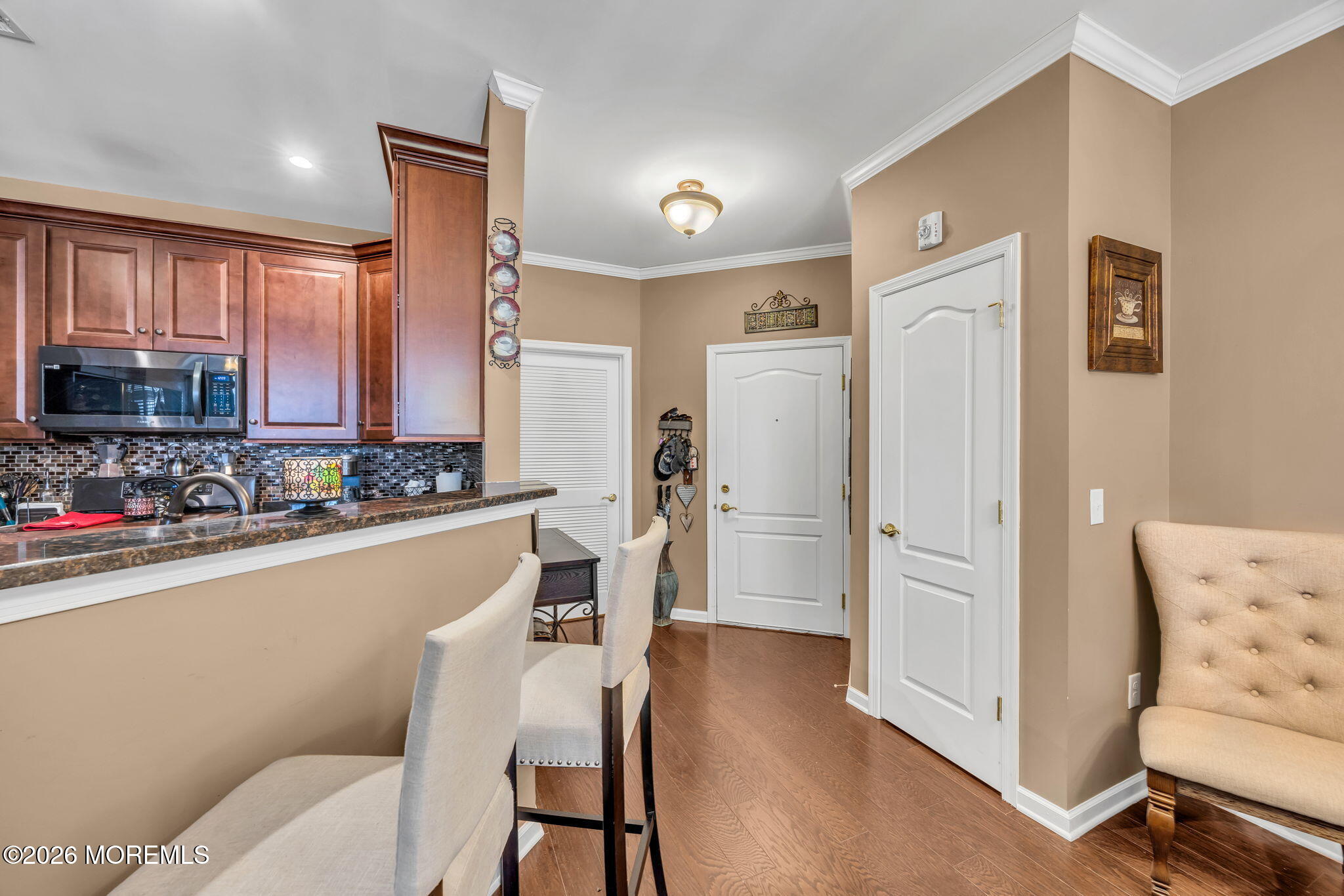 17 Stock Court, Unit 3631 Old Bridge, NJ 08857 - Photo 4 of 24 a kitchen with stainless steel appliances granite countertop a refrigerator and a stove top oven