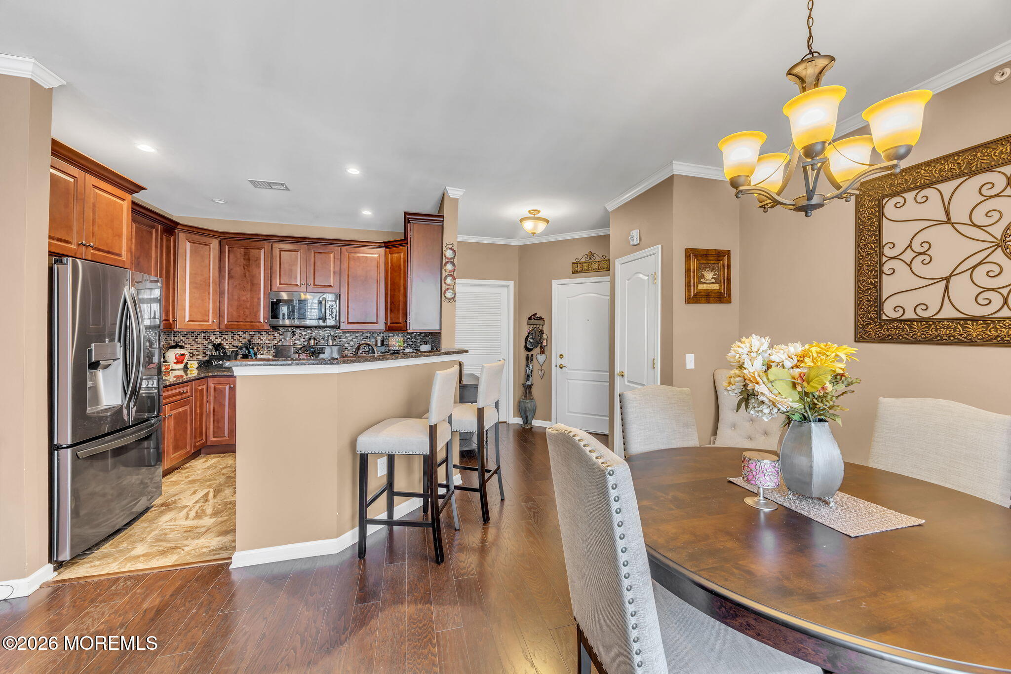 17 Stock Court, Unit 3631 Old Bridge, NJ 08857 - Photo 9 of 24 a living room with kitchen island granite countertop furniture and a kitchen view