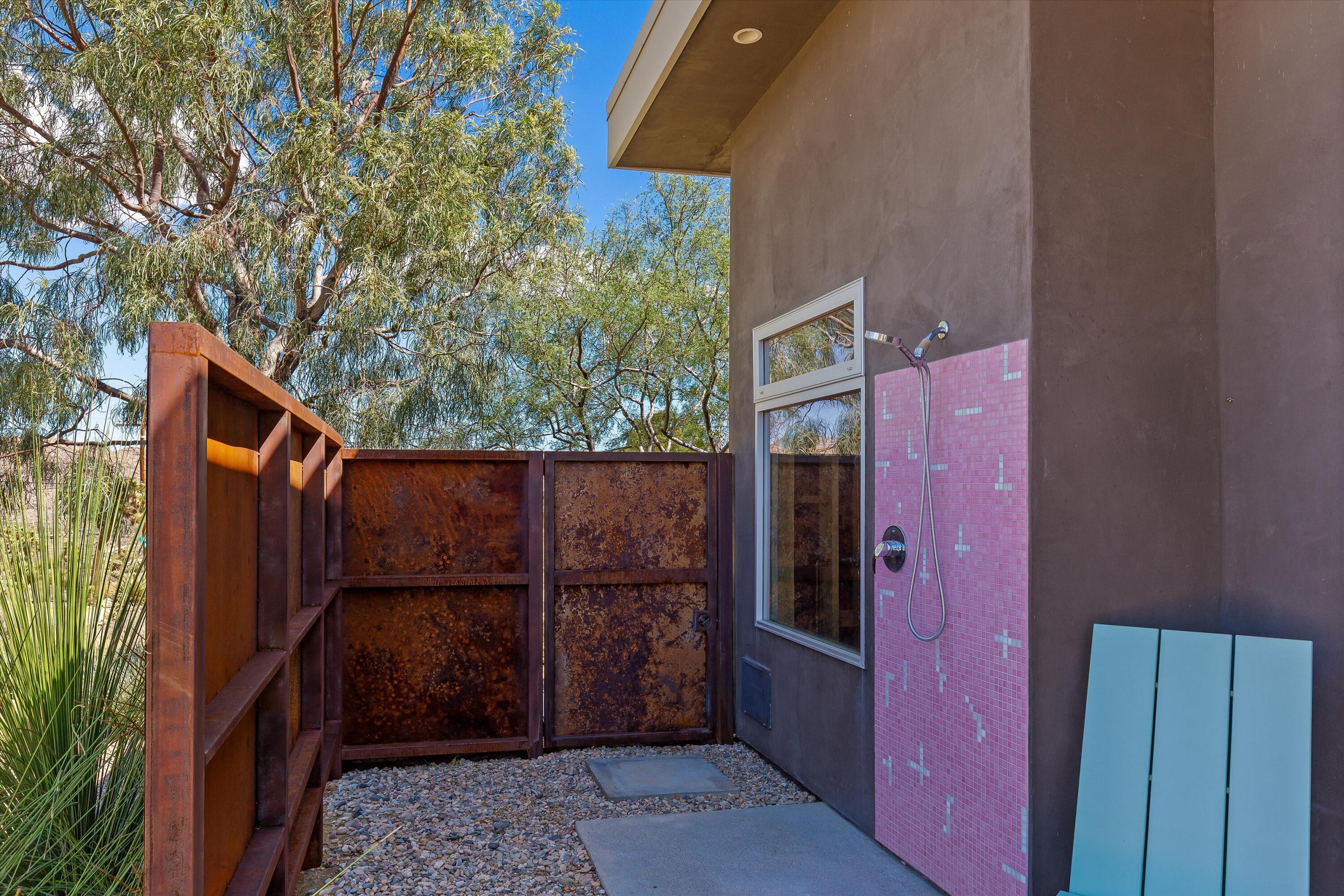 8744 Star Lane Joshua Tree, CA 92252 - Photo 9 of 55 a view of a wooden door and an outdoor space