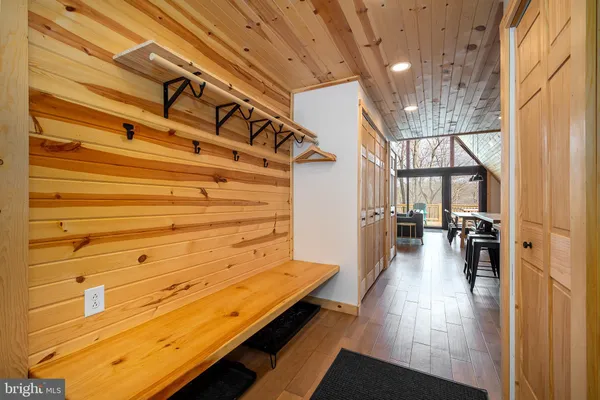 a view of bedroom with a bed and balcony
