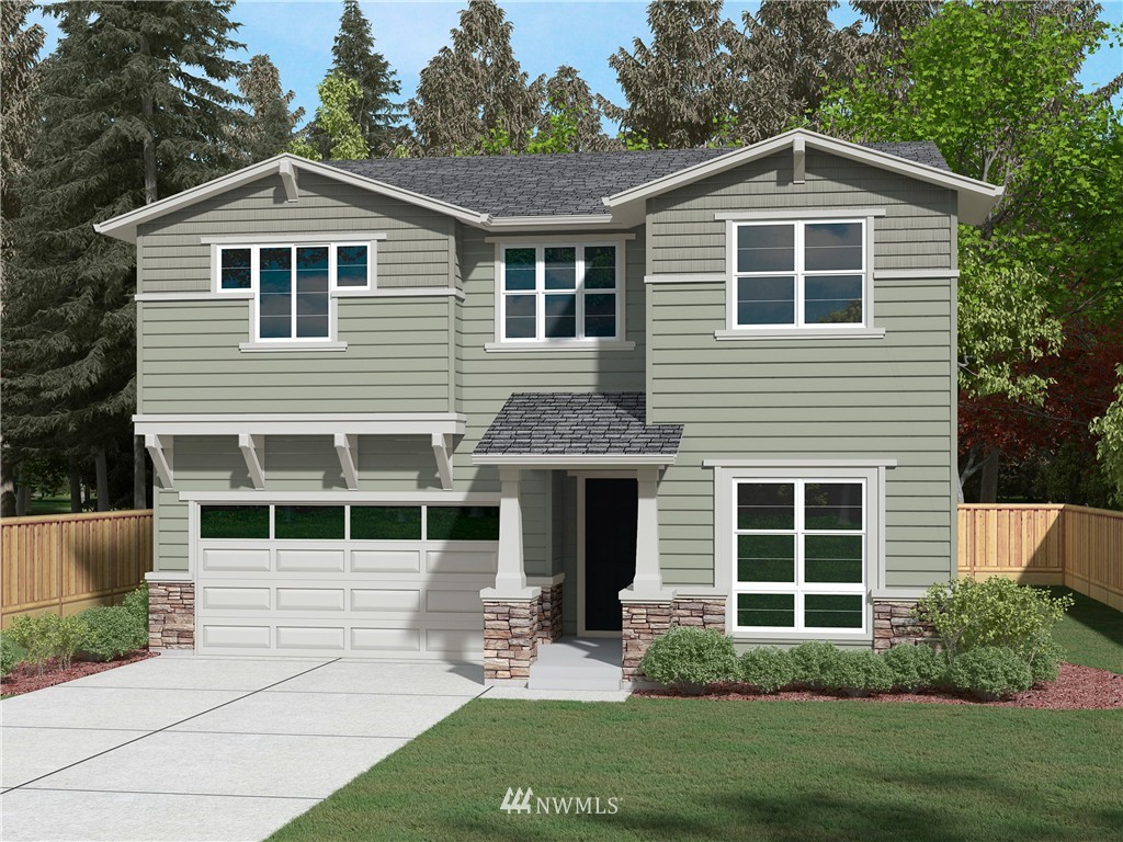 322 Field Place Southeast Renton, WA 98059 - Photo 1 of 25 a front view of a house with a yard and porch