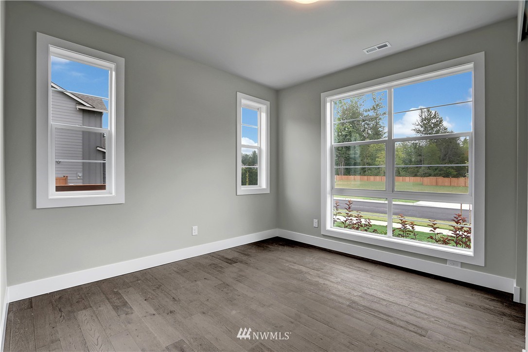 322 Field Place Southeast Renton, WA 98059 - Photo 13 of 25 a view of room with window and hardwood floor