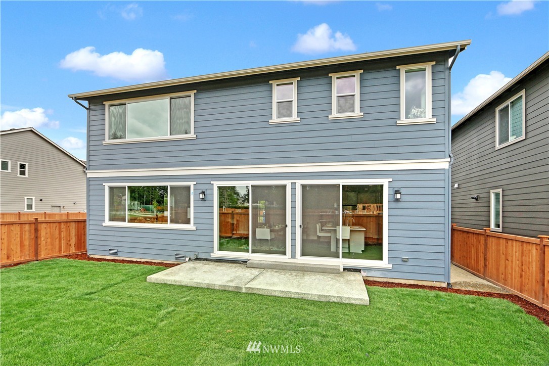 322 Field Place Southeast Renton, WA 98059 - Photo 25 of 25 a view of a house with a yard and plants