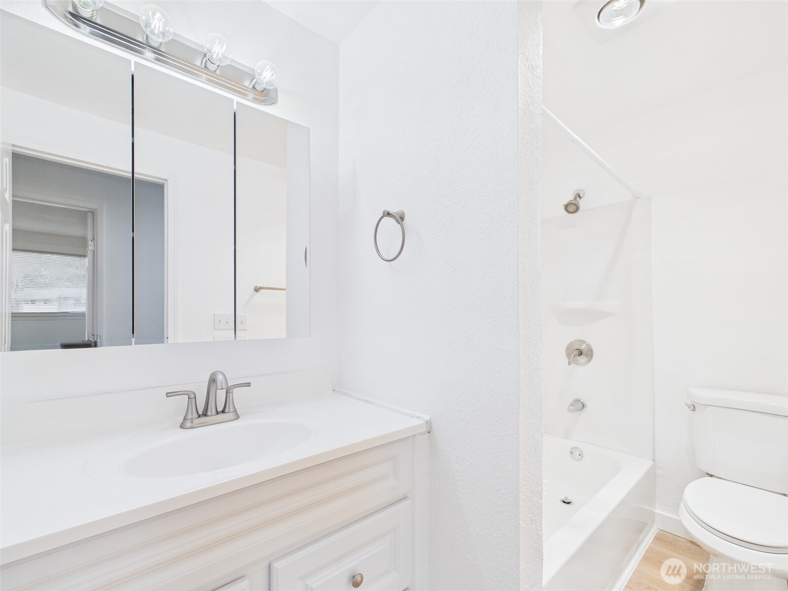 32142 46th Place Southwest, Unit M6 Federal Way, WA 98023 - Photo 12 of 29 a bathroom with a sink a toilet and shower