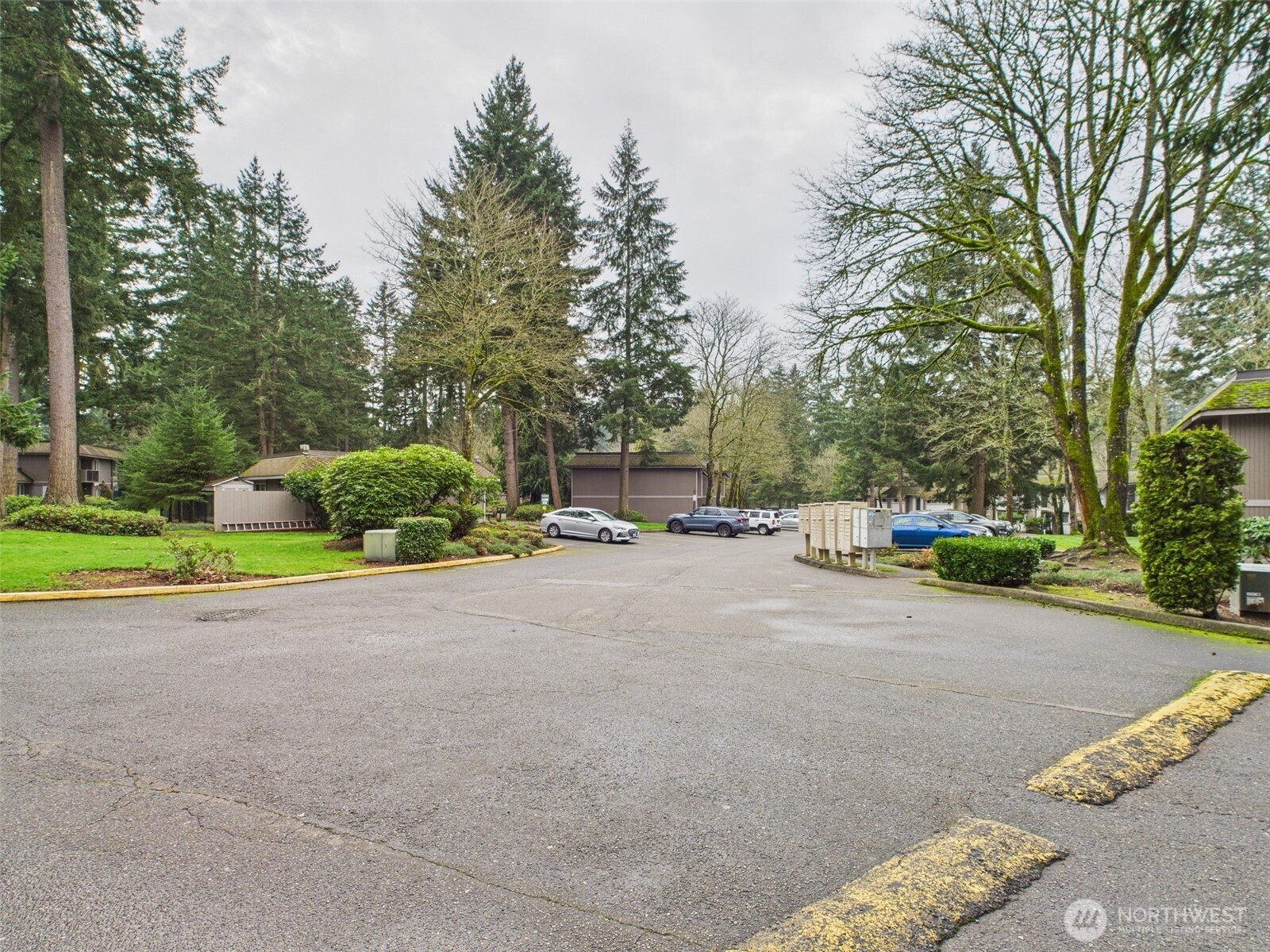 32142 46th Place Southwest, Unit M6 Federal Way, WA 98023 - Photo 24 of 29 a view of a street with a house