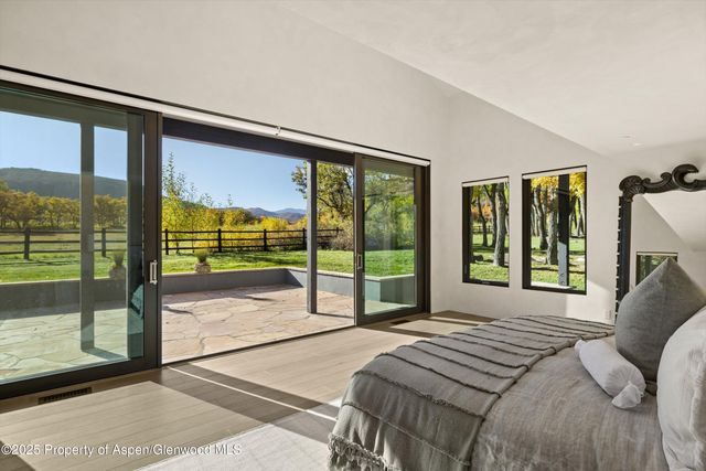 a view of a swimming pool with an outdoor space and seating area