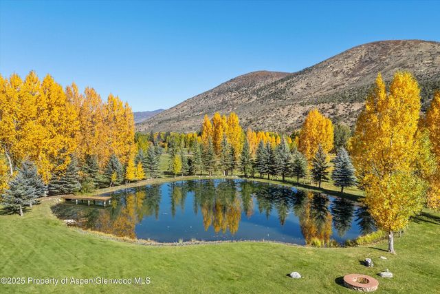 a view of a lake with a mountain