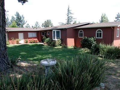319 Mecham Road Petaluma, CA 94952 - Photo 1 of 12 front view of a house with a yard