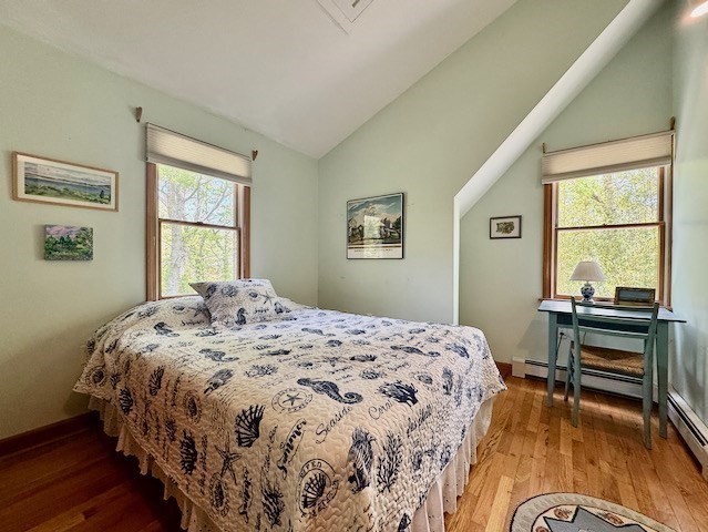 113 Leonard Circle Tisbury, MA 02568 - Photo 11 of 25 a bedroom with a bed and a window
