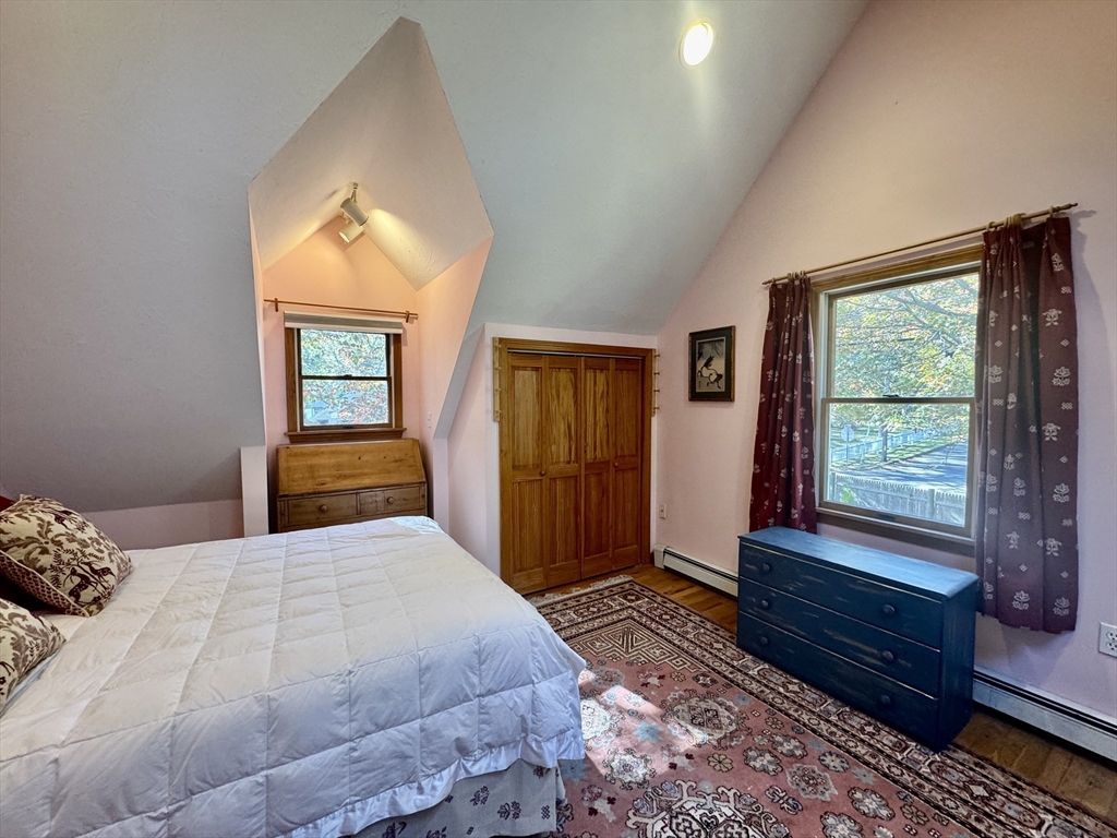 113 Leonard Circle Tisbury, MA 02568 - Photo 18 of 25 a bedroom with a bed and a window