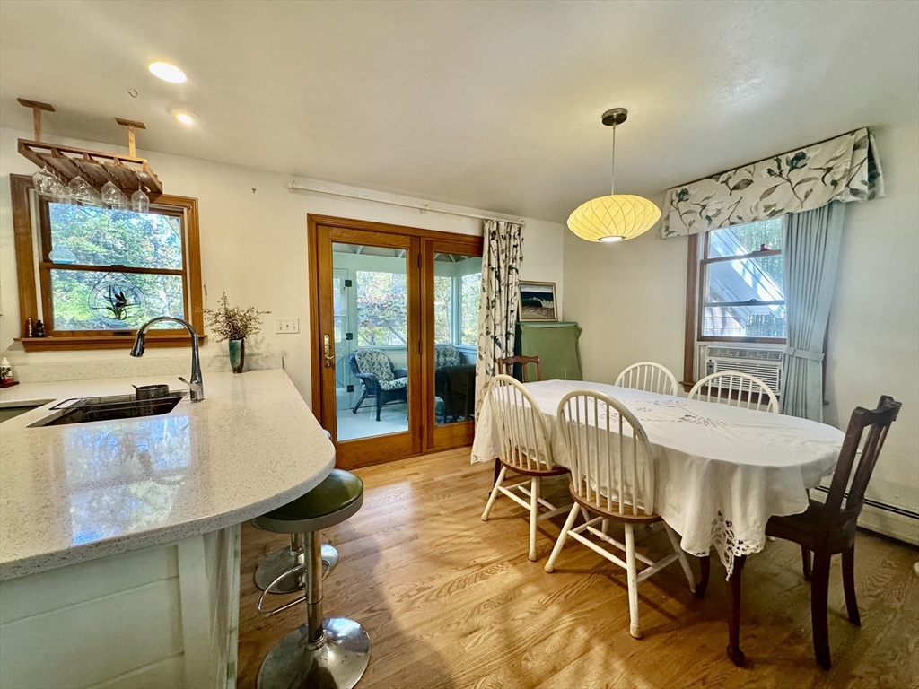 113 Leonard Circle Tisbury, MA 02568 - Photo 20 of 25 a dining room with furniture and window