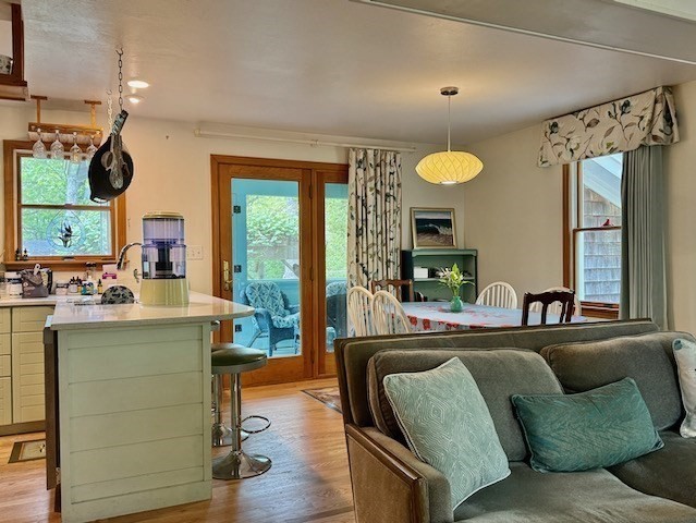 113 Leonard Circle Tisbury, MA 02568 - Photo 9 of 25 a living room with a couch and a table