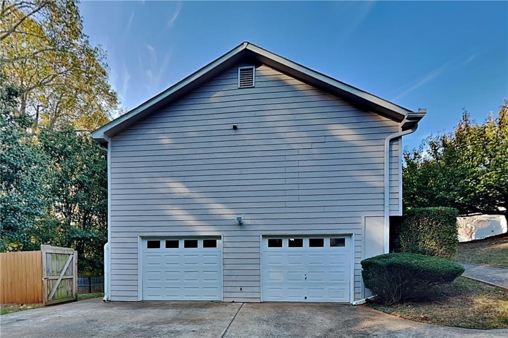 132 Hickory View Lane Acworth, GA 30101 - Photo 19 of 23 a front view of a house with garage