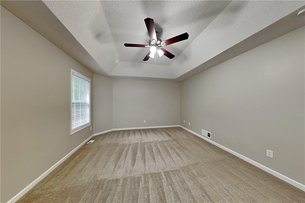 132 Hickory View Lane Acworth, GA 30101 - Photo 8 of 23 wooden floor in an empty room with a window