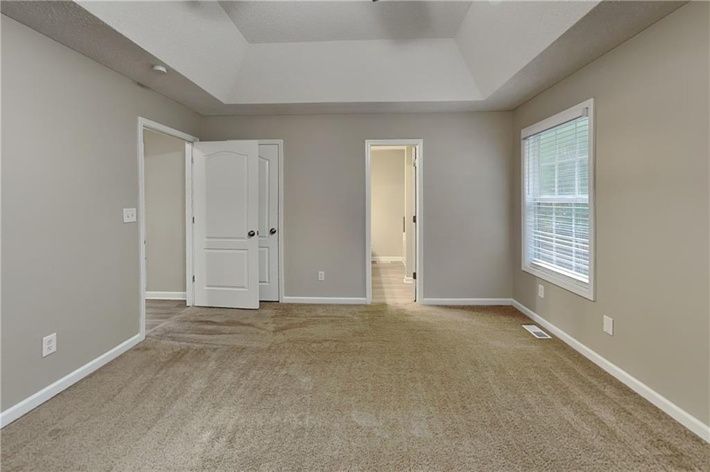 132 Hickory View Lane Acworth, GA 30101 - Photo 9 of 23 an empty room with windows