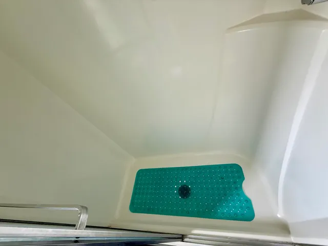 a living room with furniture rug and wooden floor