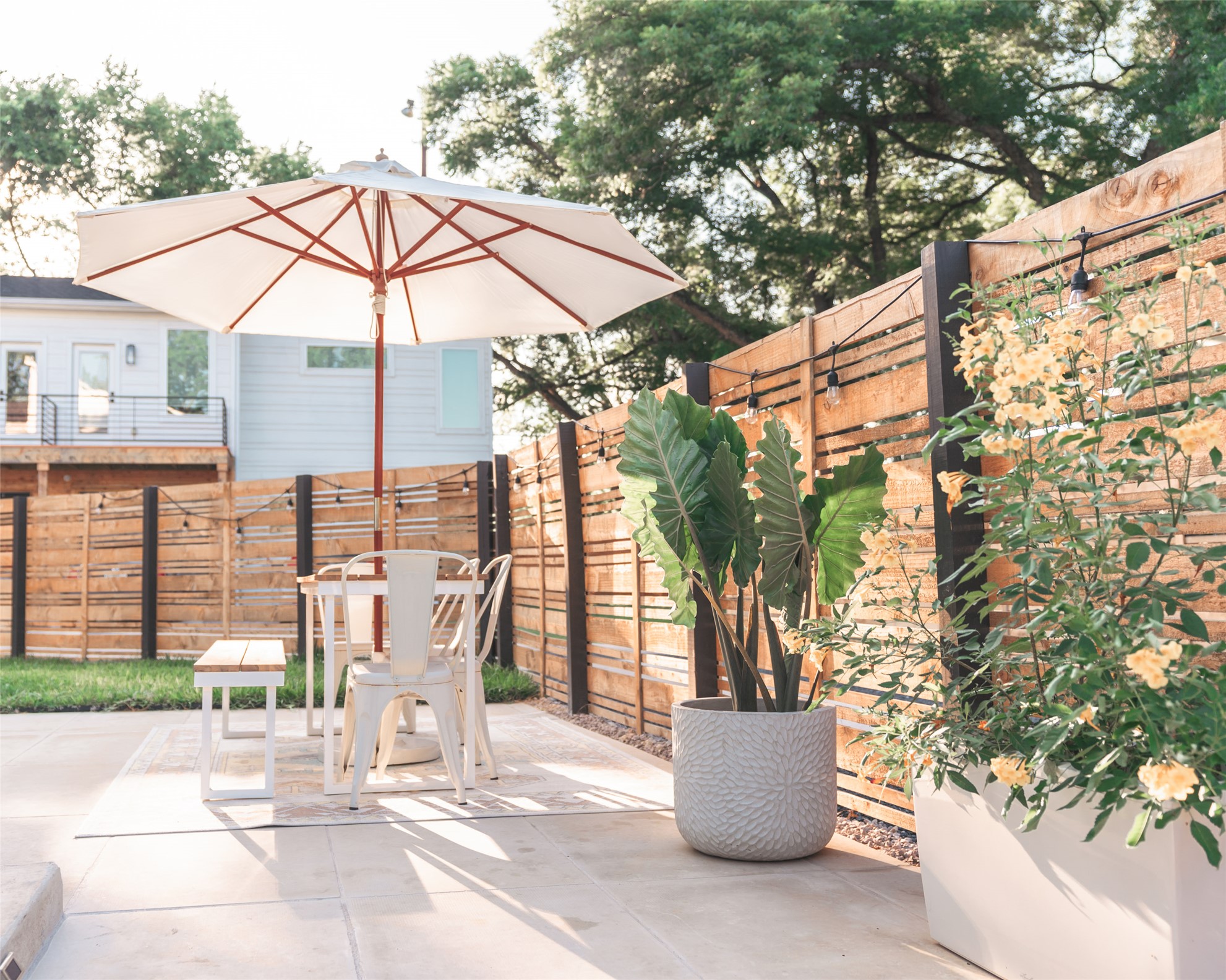 1106 Walton Lane, Unit B Austin, TX 78721 - Photo 11 of 28 Fenced backyard featuring a patio area