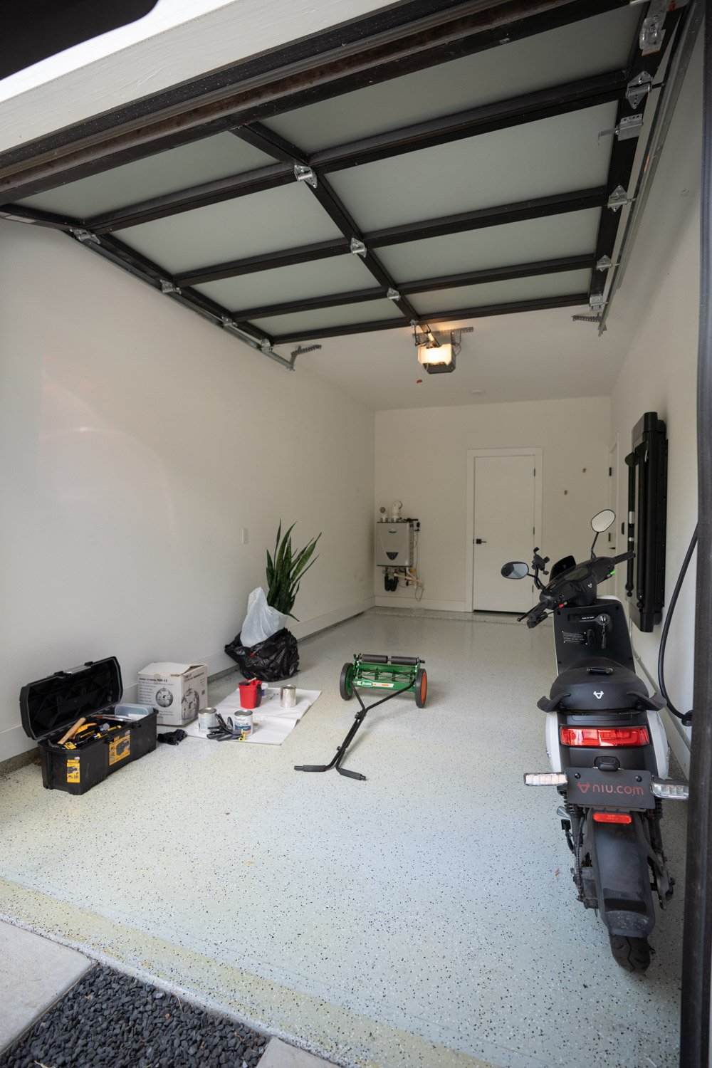 1106 Walton Lane, Unit B Austin, TX 78721 - Photo 25 of 28 Garage featuring water heater