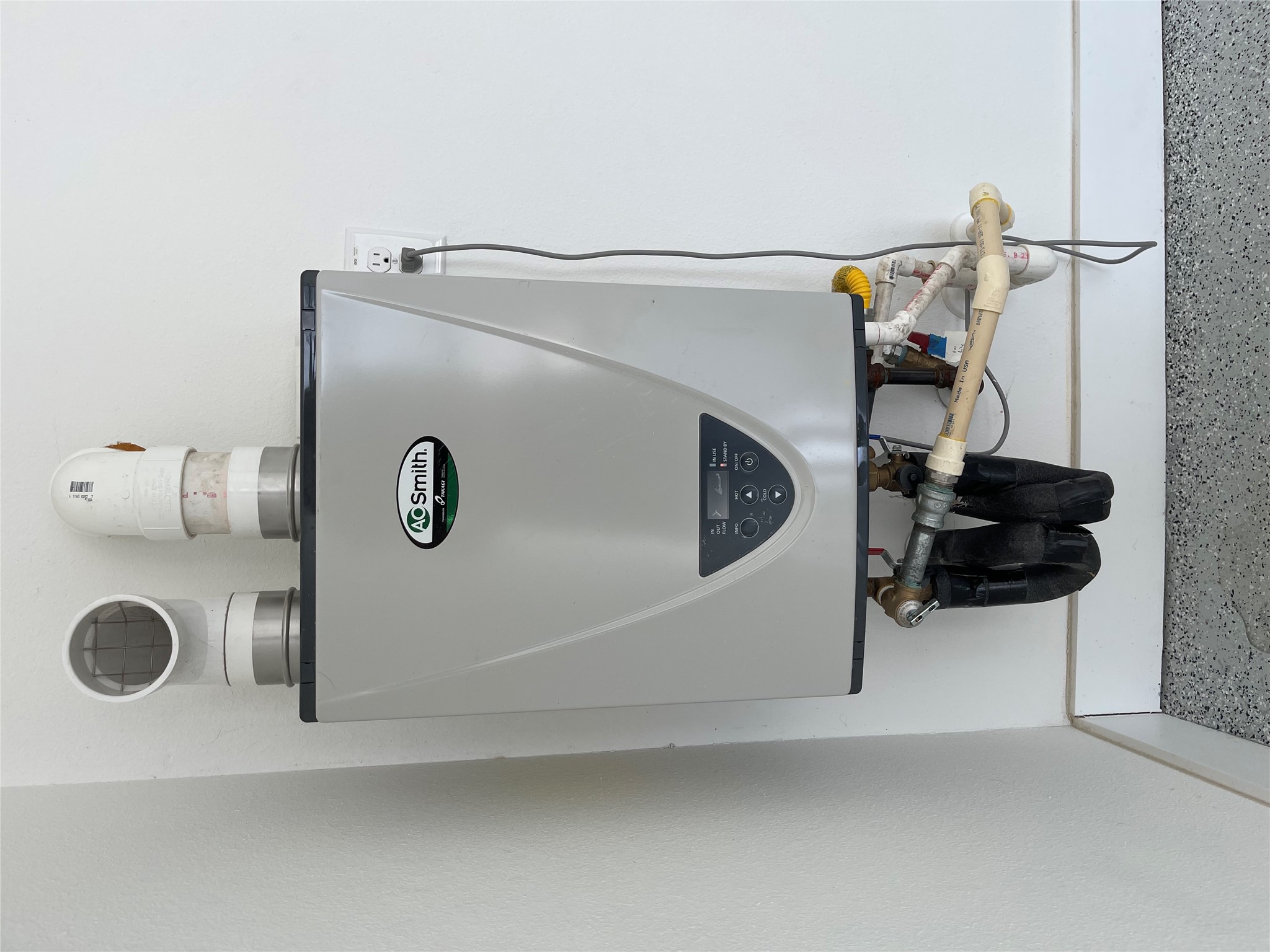 1106 Walton Lane, Unit B Austin, TX 78721 - Photo 27 of 28 Detailed view of water heater and baseboards