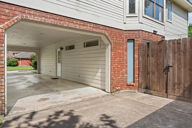 a view of a house with a parking space