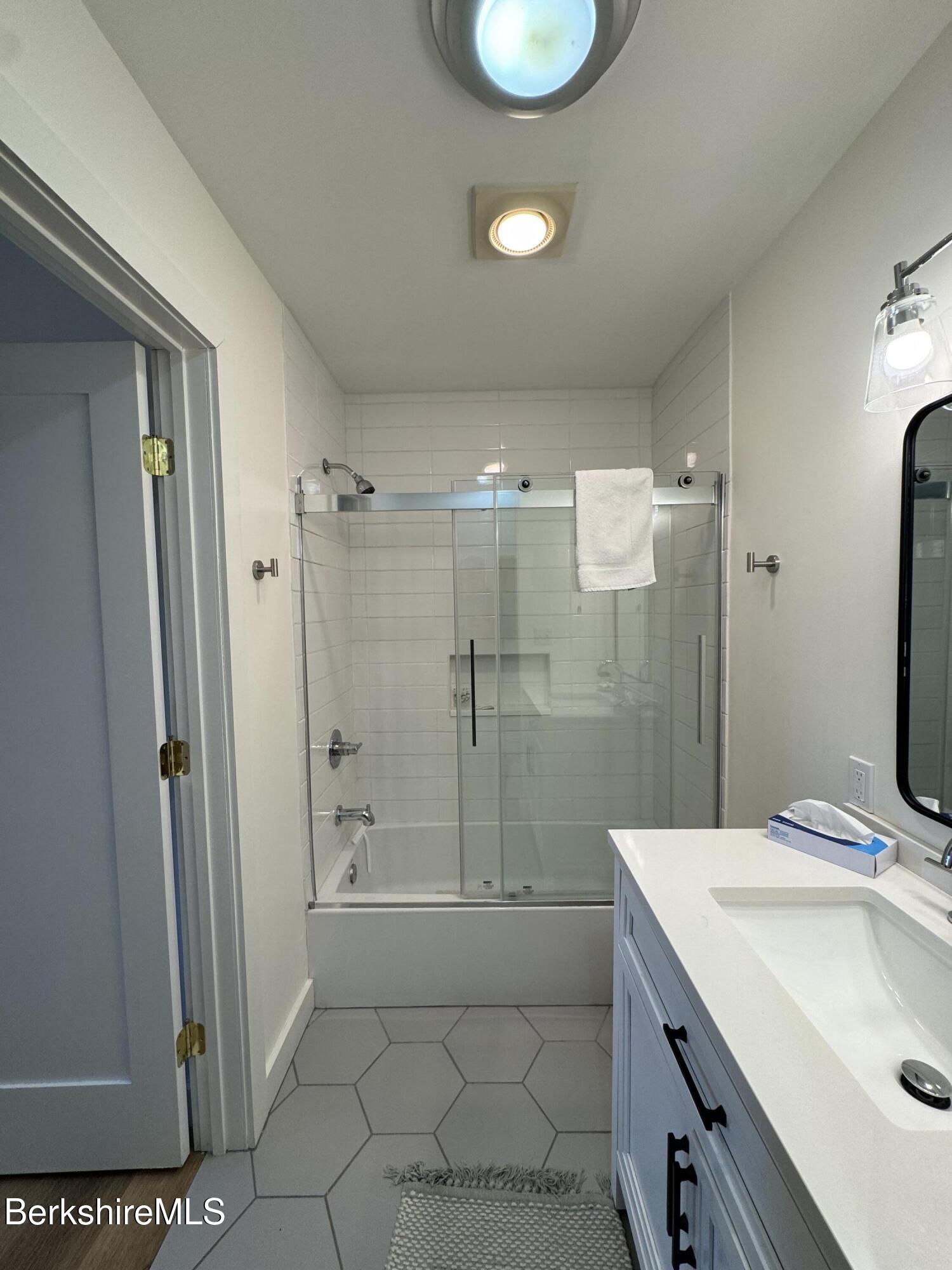 803 Crane Hancock, MA 01237 - Photo 21 of 24 a bathroom with a sink a toilet and shower