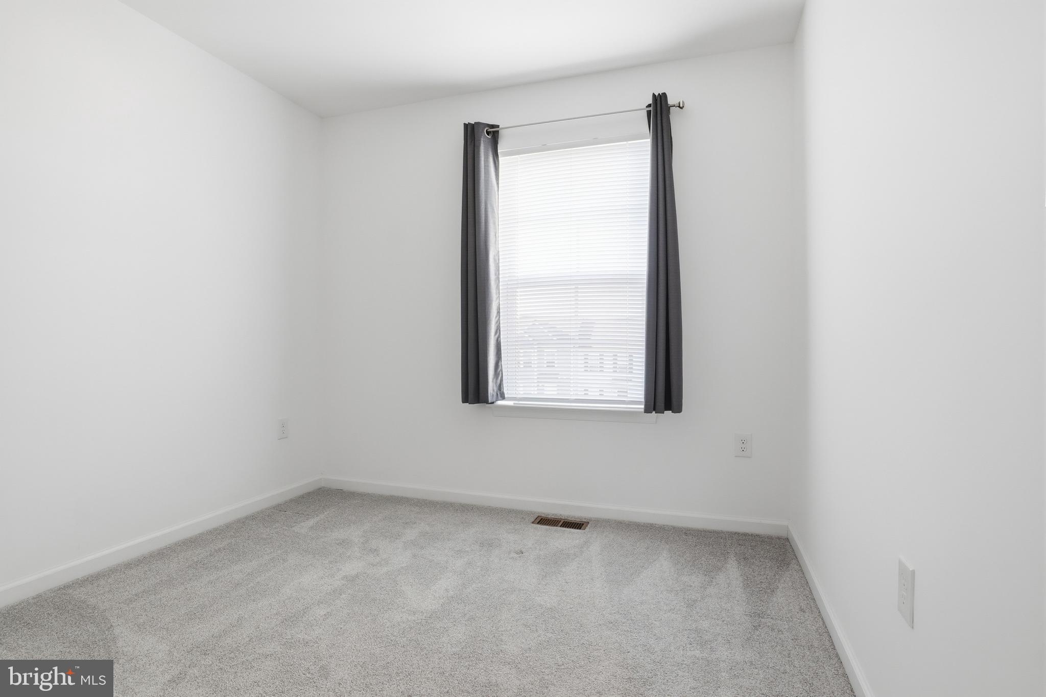 202 Homestead Drive Hanover, PA 17331 - Photo 12 of 29 an empty room with a window