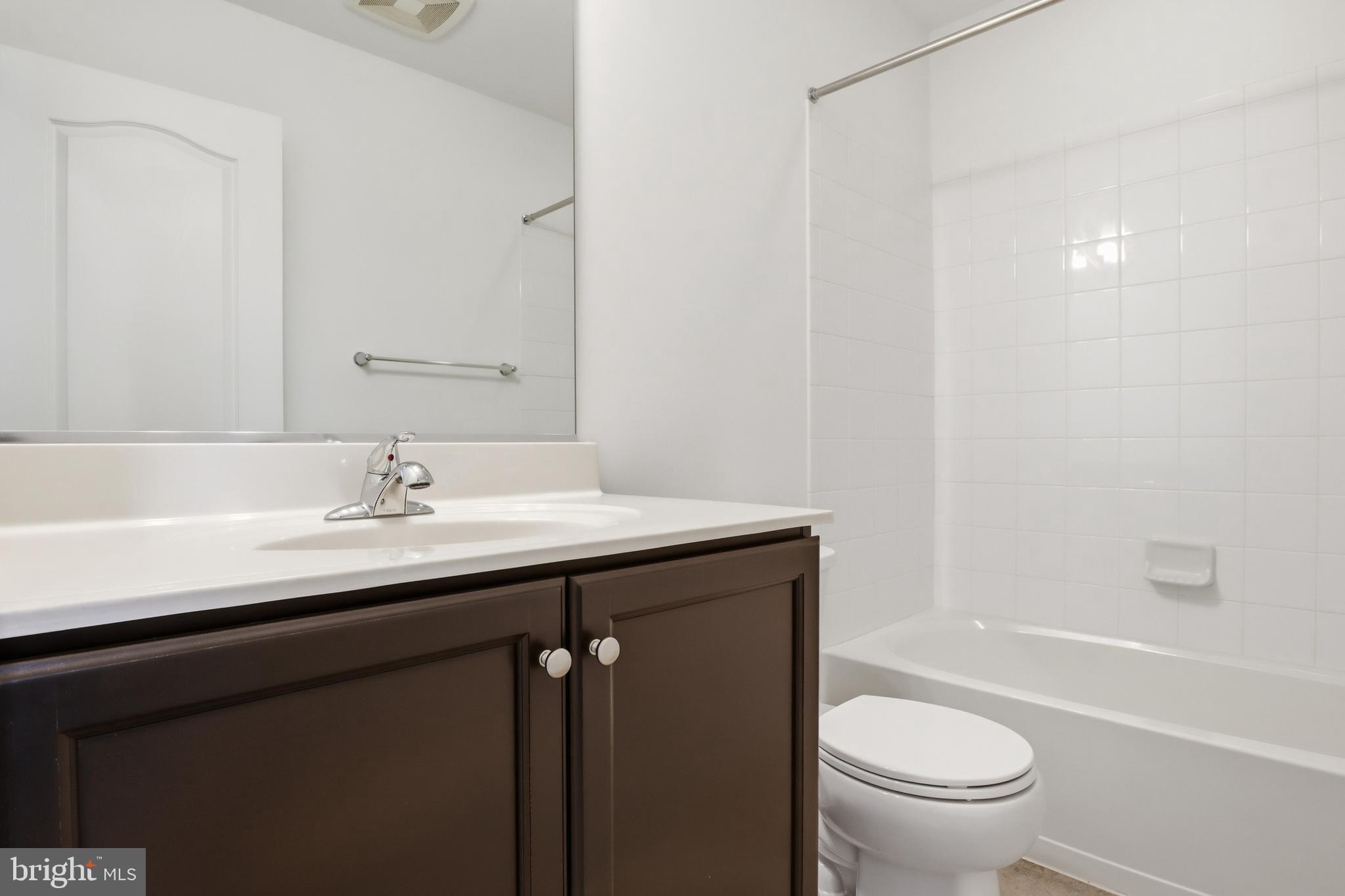 202 Homestead Drive Hanover, PA 17331 - Photo 15 of 29 a bathroom with a sink a toilet and a bathtub