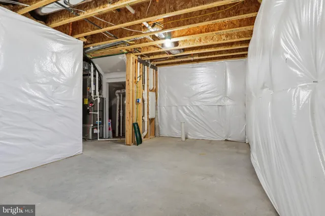 a view of a room with wooden walls