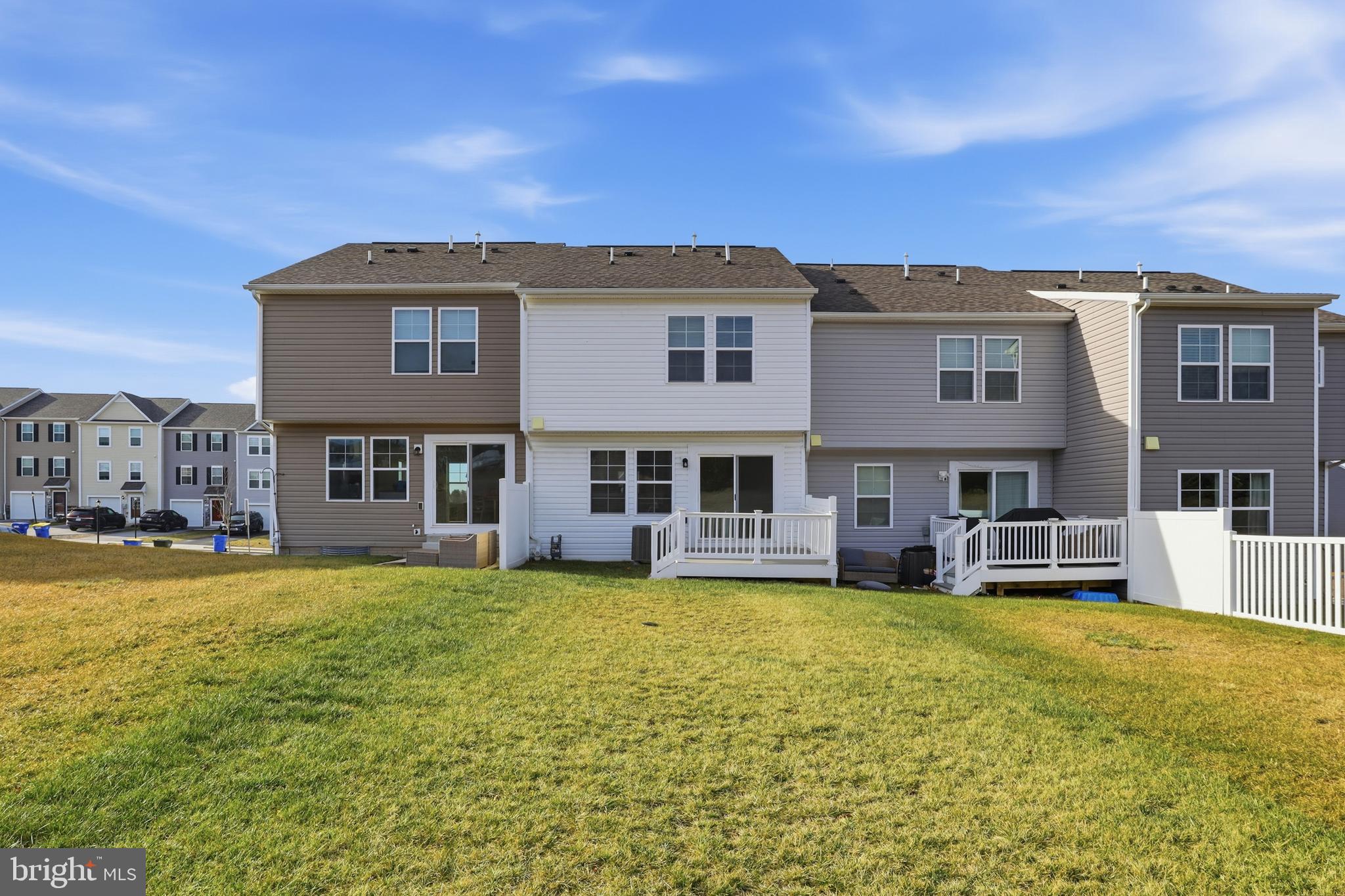 202 Homestead Drive Hanover, PA 17331 - Photo 27 of 29 a view of a large pool with lawn chairs and a yard