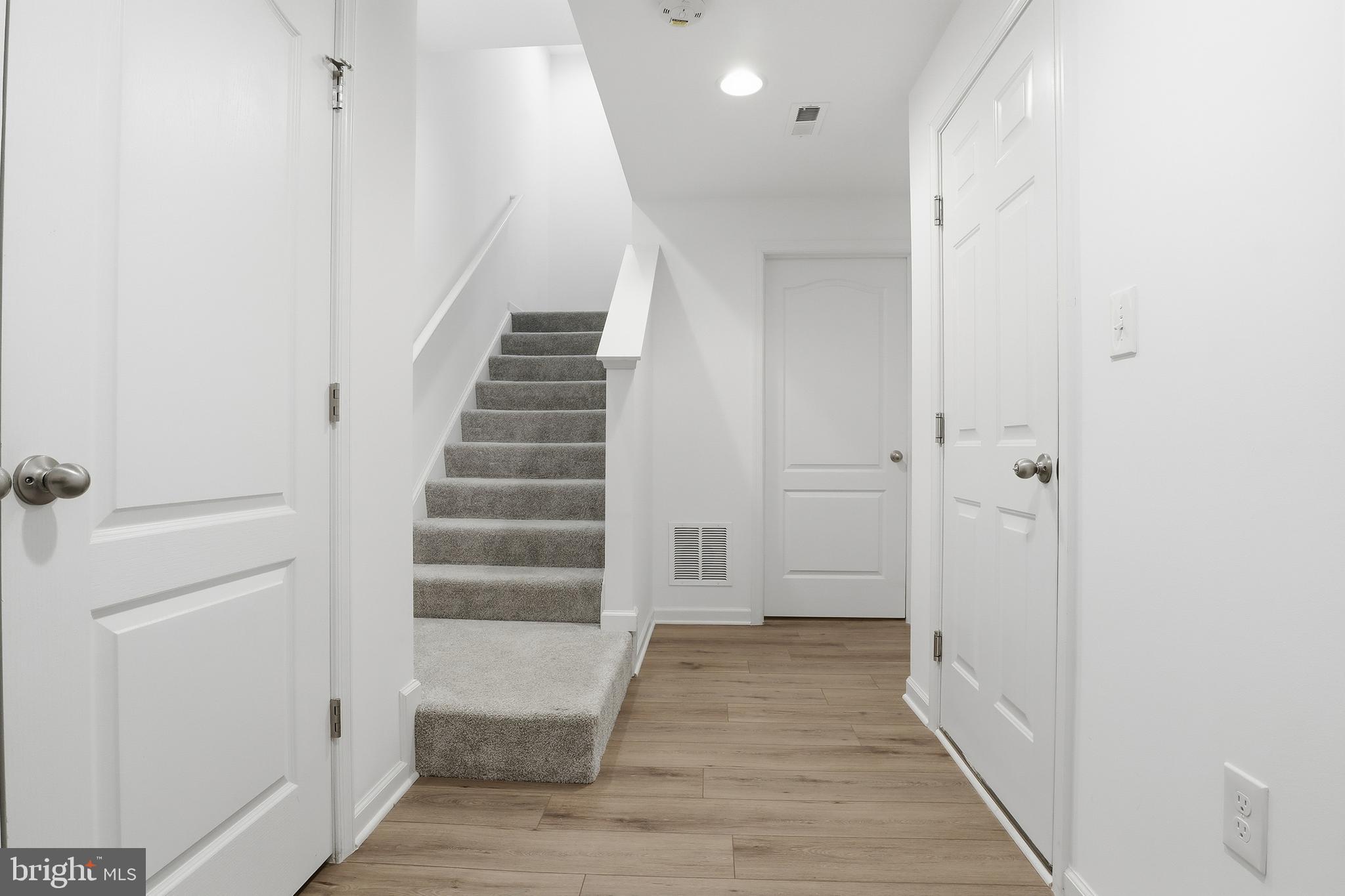 202 Homestead Drive Hanover, PA 17331 - Photo 3 of 29 a view of a hallway with wooden floor and entryway
