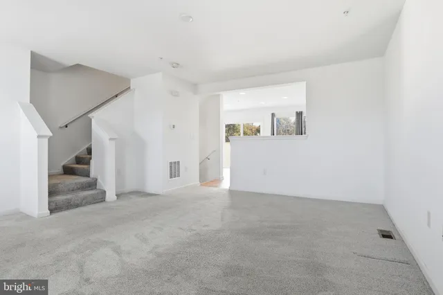 an empty room with a natural light