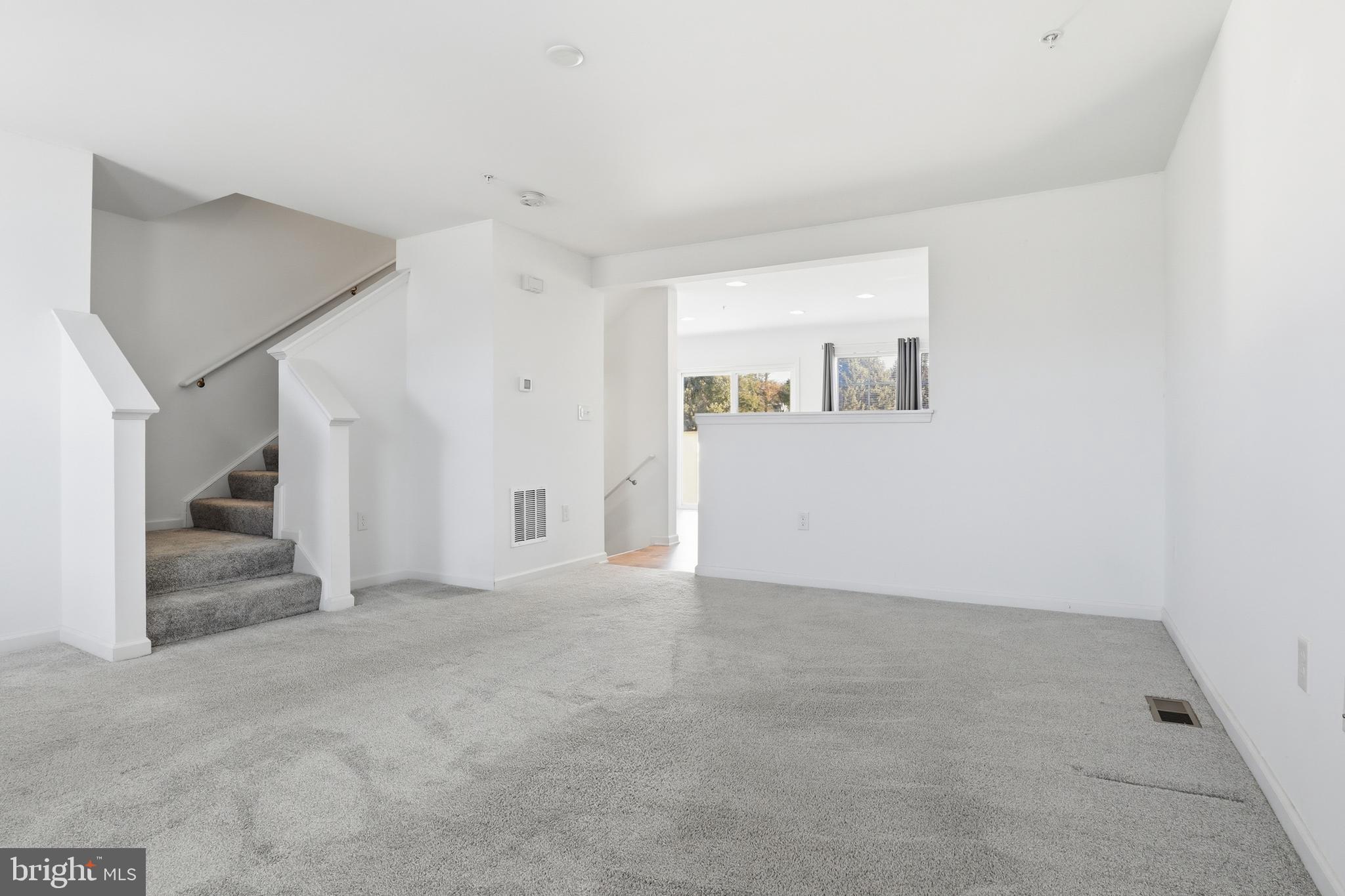 202 Homestead Drive Hanover, PA 17331 - Photo 6 of 29 an empty room with a natural light