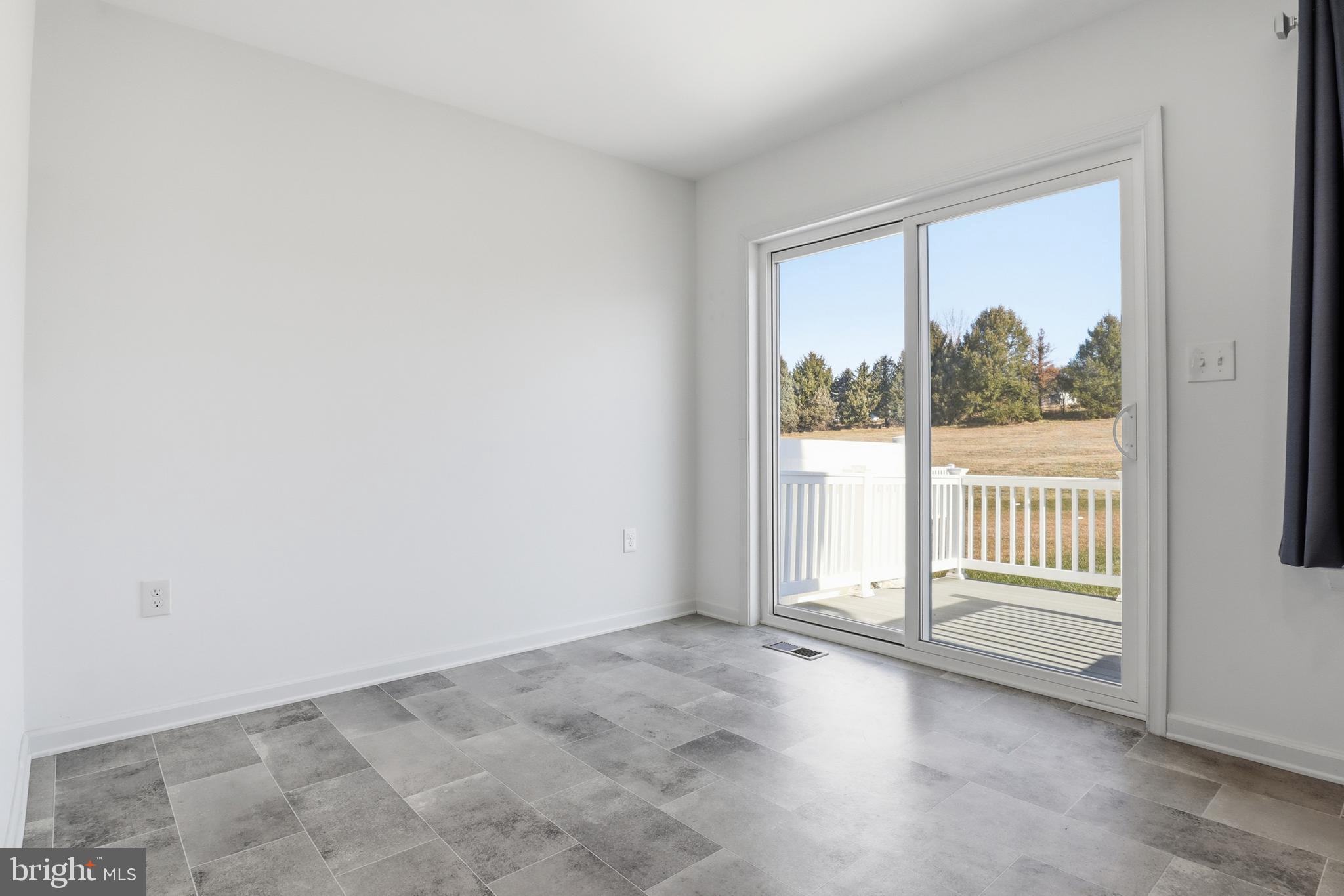 202 Homestead Drive Hanover, PA 17331 - Photo 7 of 29 an empty room with a large window