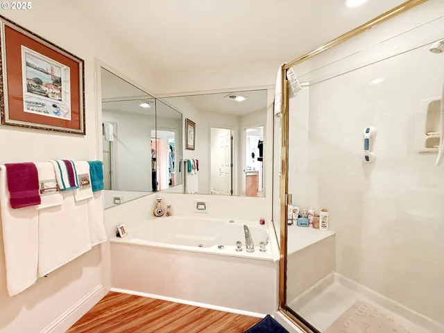 a bathroom with a bathtub and a sink