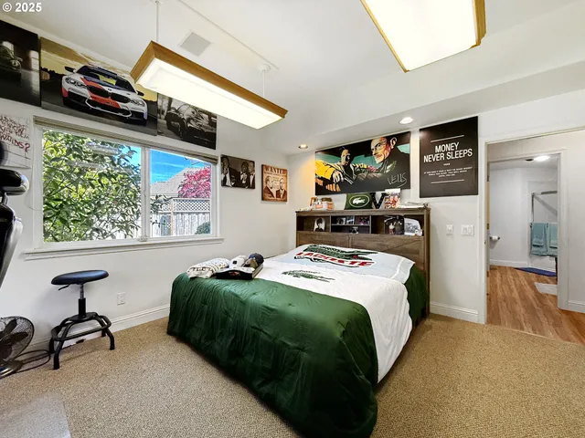 a bedroom with bed and window