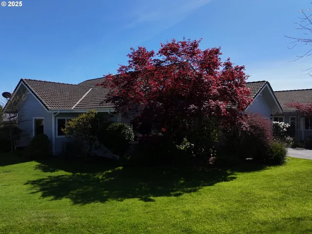 a view of a house with a garden