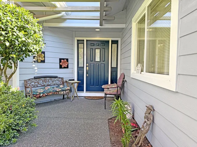 a outdoor living space with furniture and a potted plant