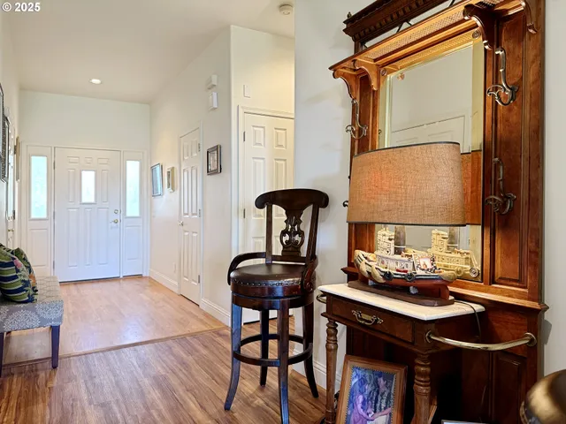 a room with furniture and wooden floor