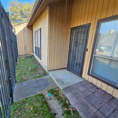 a view of a back yard from a balcony