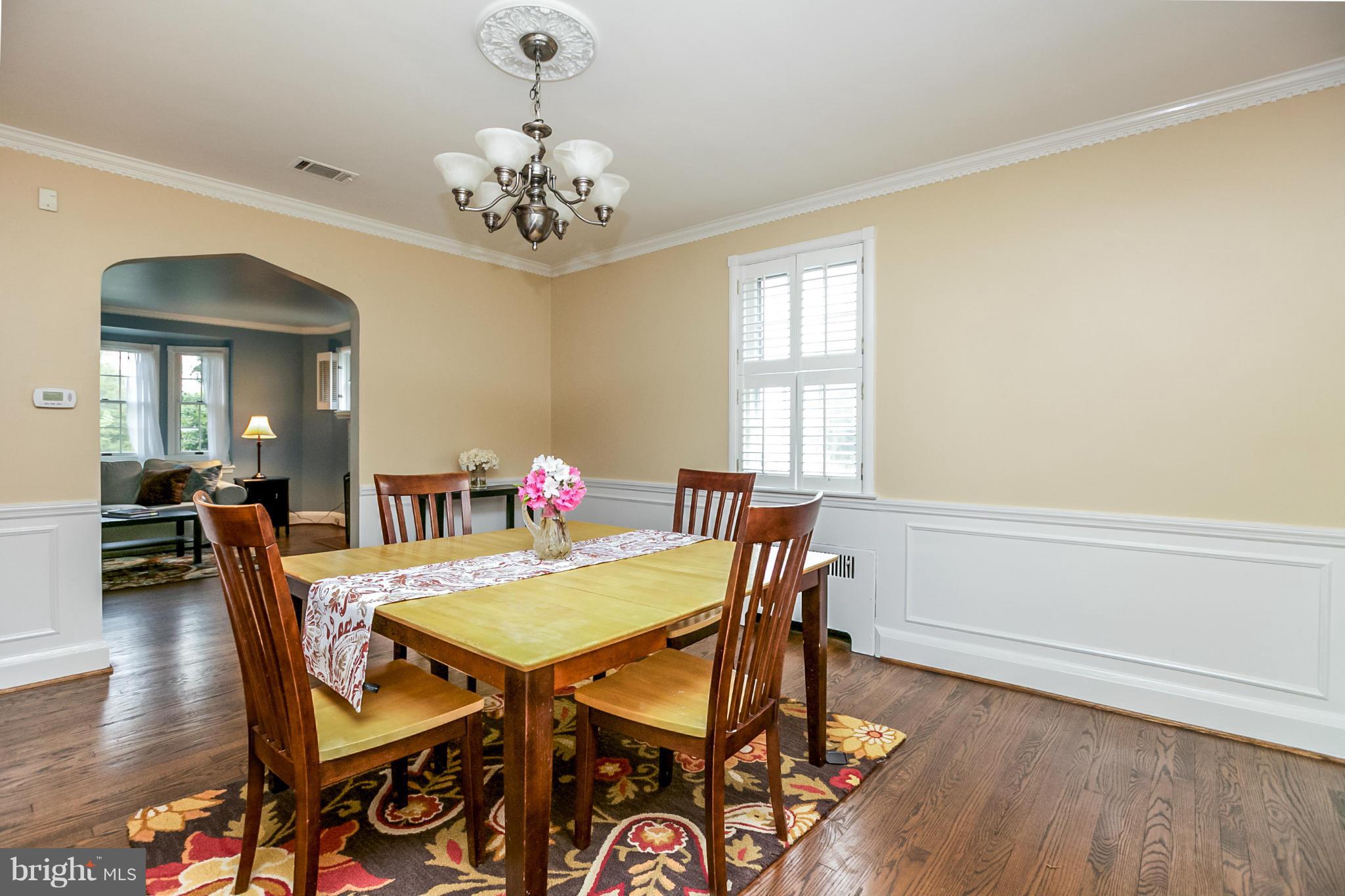2 Dunkirk Road Baltimore, MD 21212 - Photo 8 of 29 a view of a dining room with furniture and wooden floor
