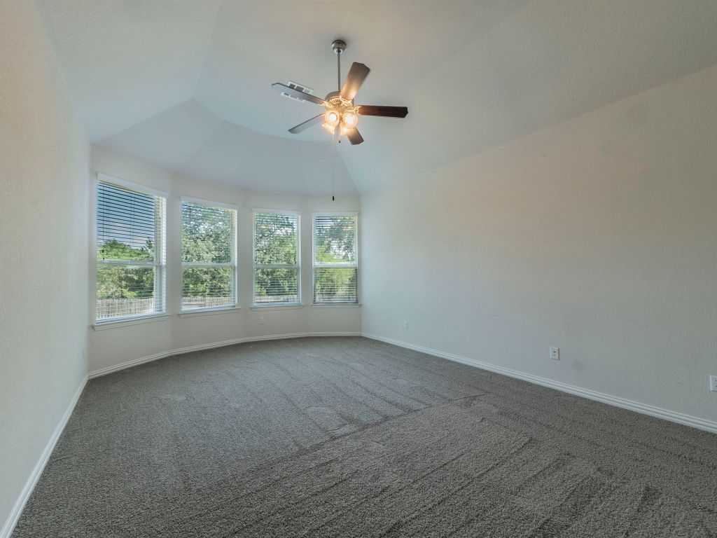 244 Fort Cobb Way Georgetown, TX 78628 - Photo 13 of 29 an empty room with a window