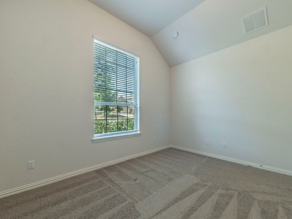 244 Fort Cobb Way Georgetown, TX 78628 - Photo 17 of 29 an empty room with a window