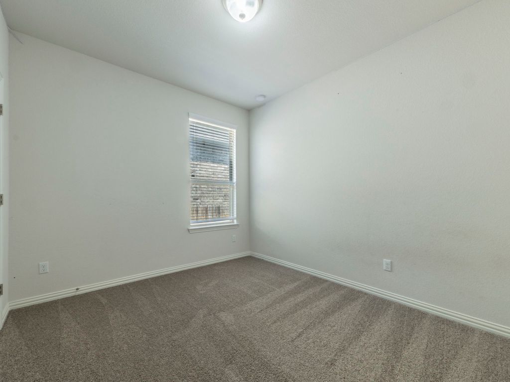 244 Fort Cobb Way Georgetown, TX 78628 - Photo 21 of 29 an empty room with a window