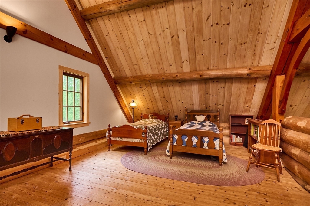 486 Old Stage Road Ashfield, MA 01330 - Photo 22 of 36 a living room with furniture and a window