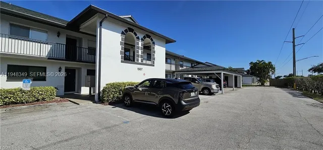 a car parked in front of a house