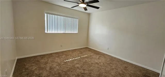 a swimming pool with outdoor seating and yard