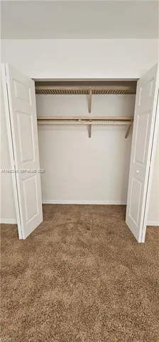 a view of a swimming pool and an outdoor seating