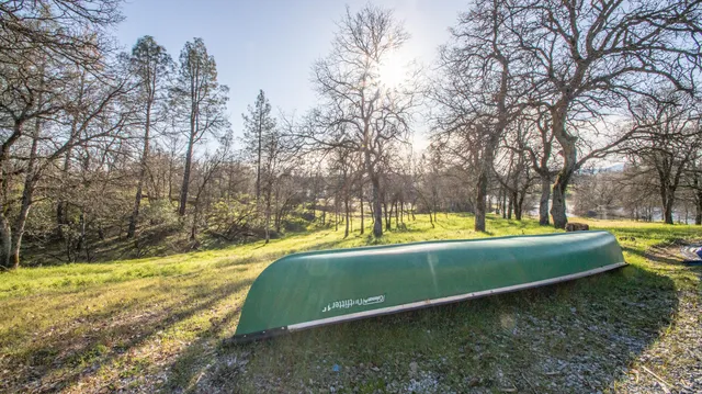 a view of a yard with swimming pool