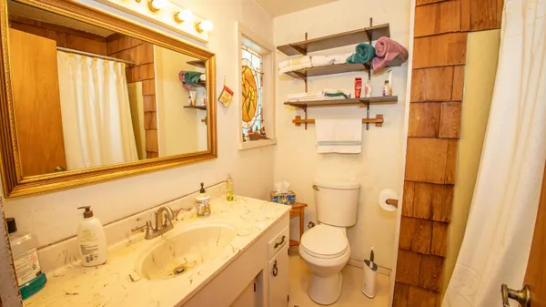 a bathroom with a sink and a toilet