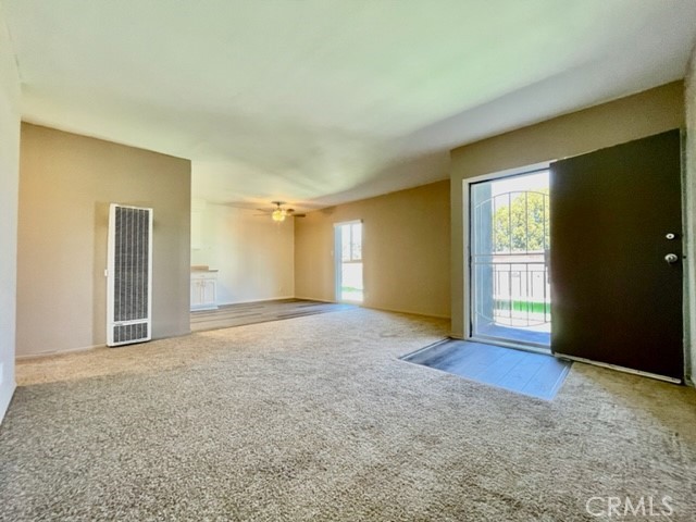 815 North Rose Avenue, Unit J Compton, CA 90221 - Photo 11 of 22 an empty room with windows and closet